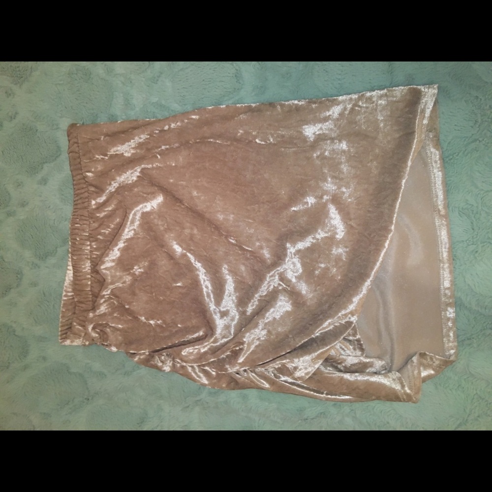 Blush pink velvet mini skirt.